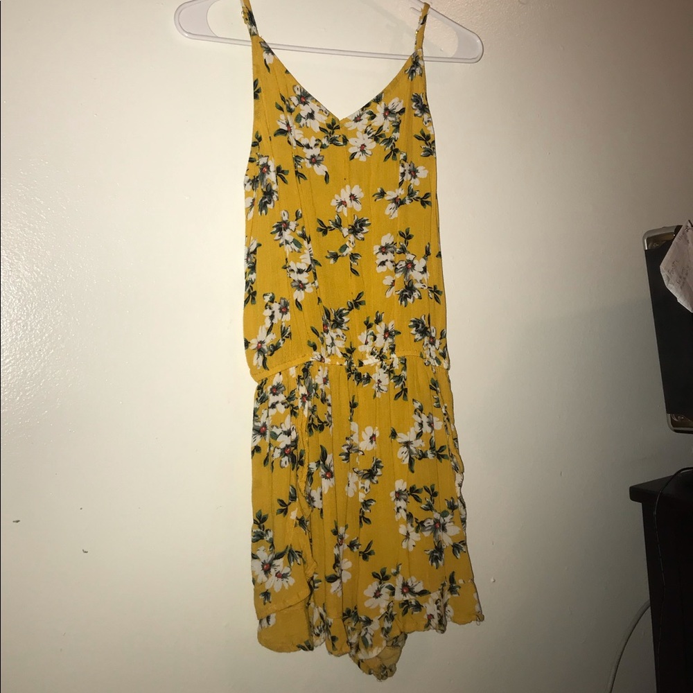 Yellow flowered romper with spaghetti straps